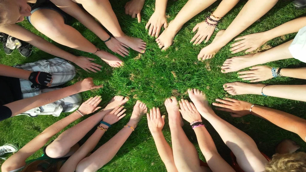 Groups formed through random team assignment collaborating during a classroom or workplace activity