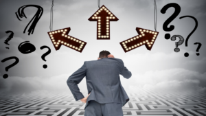 A businessman scratching his head while looking at three illuminated arrows and question marks above a maze, introducing Randomizers for Decision Making.