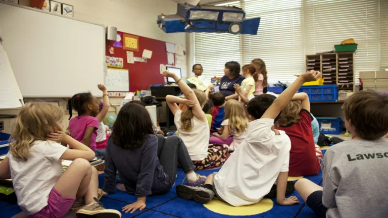 Students using games in the classroom for collaborative learning and participation